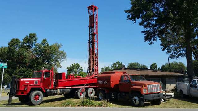 Red Company Trucks — Terre Haute, IN — West Pump & Well Service