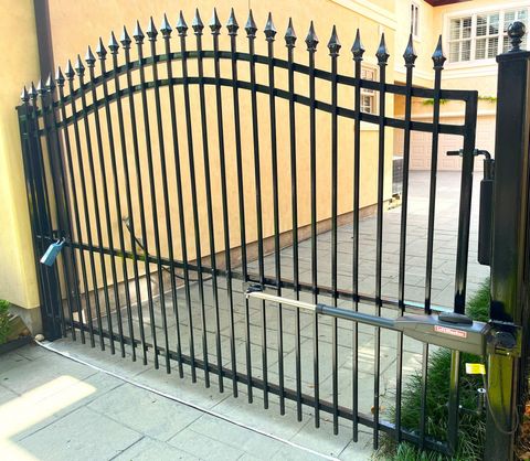 a gate that is in front of a house