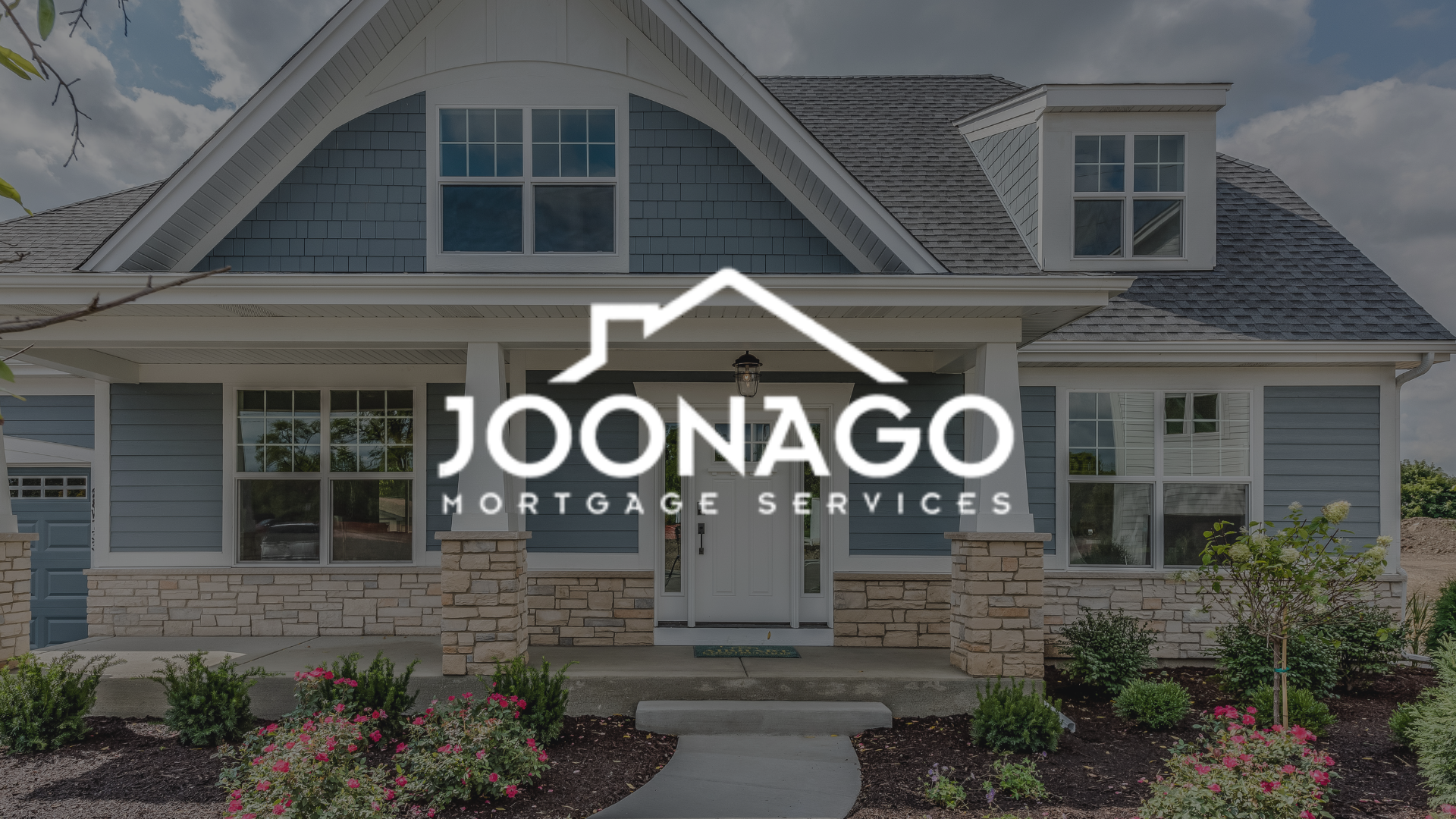 The logo for joonago mortgage services is on the front of a house.