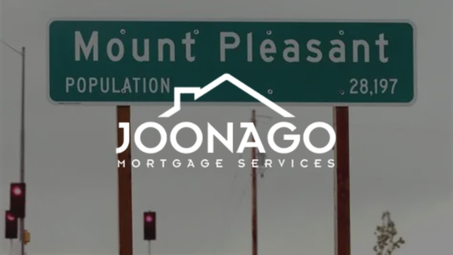 Sign for Mount Pleasant, population 28,197, overlaid with a mortgage services logo.