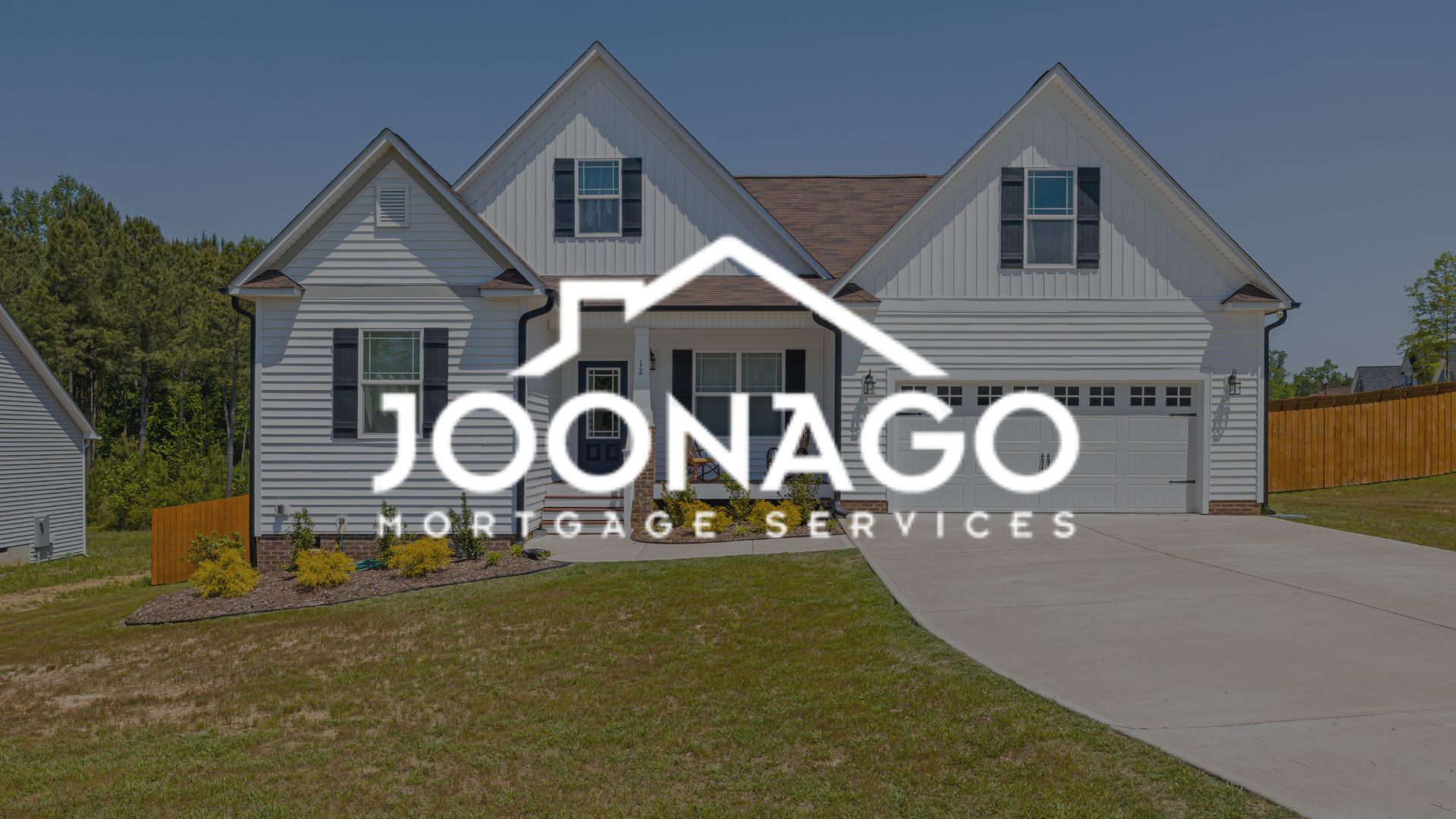 Joonago Mortgage Services logo overlaid on a white house with a brown roof and a driveway.