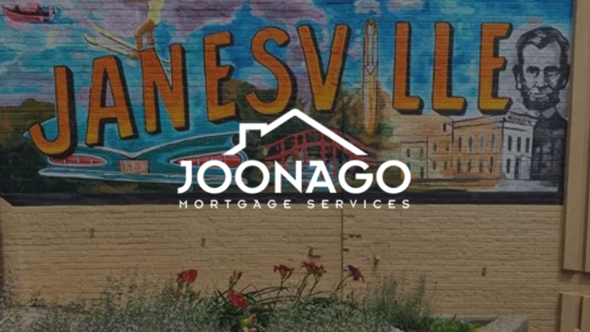 A sign that says janesville on it with a logo of joonago mortgage services