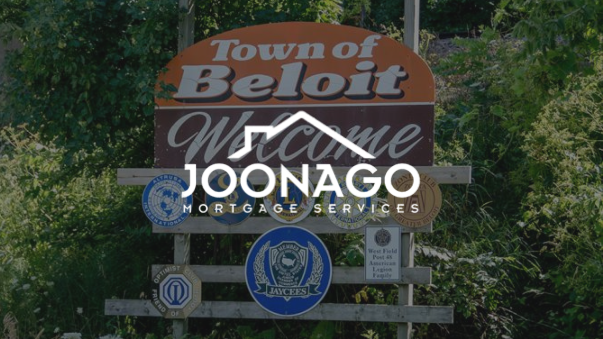 A sign that says town of beloit welcome joonago mortgage services