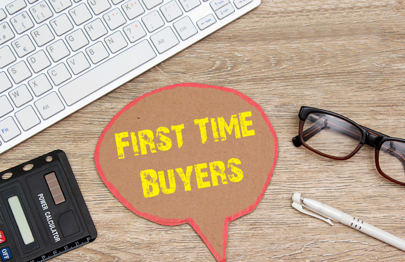 A wooden table with a speech bubble that says `` first time buyers ''.