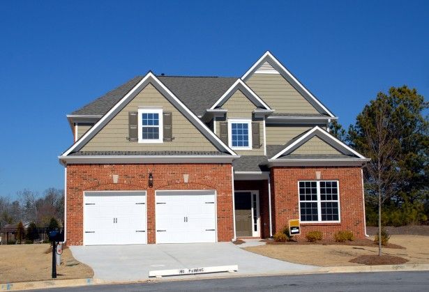 A large brick house with two garages is for sale