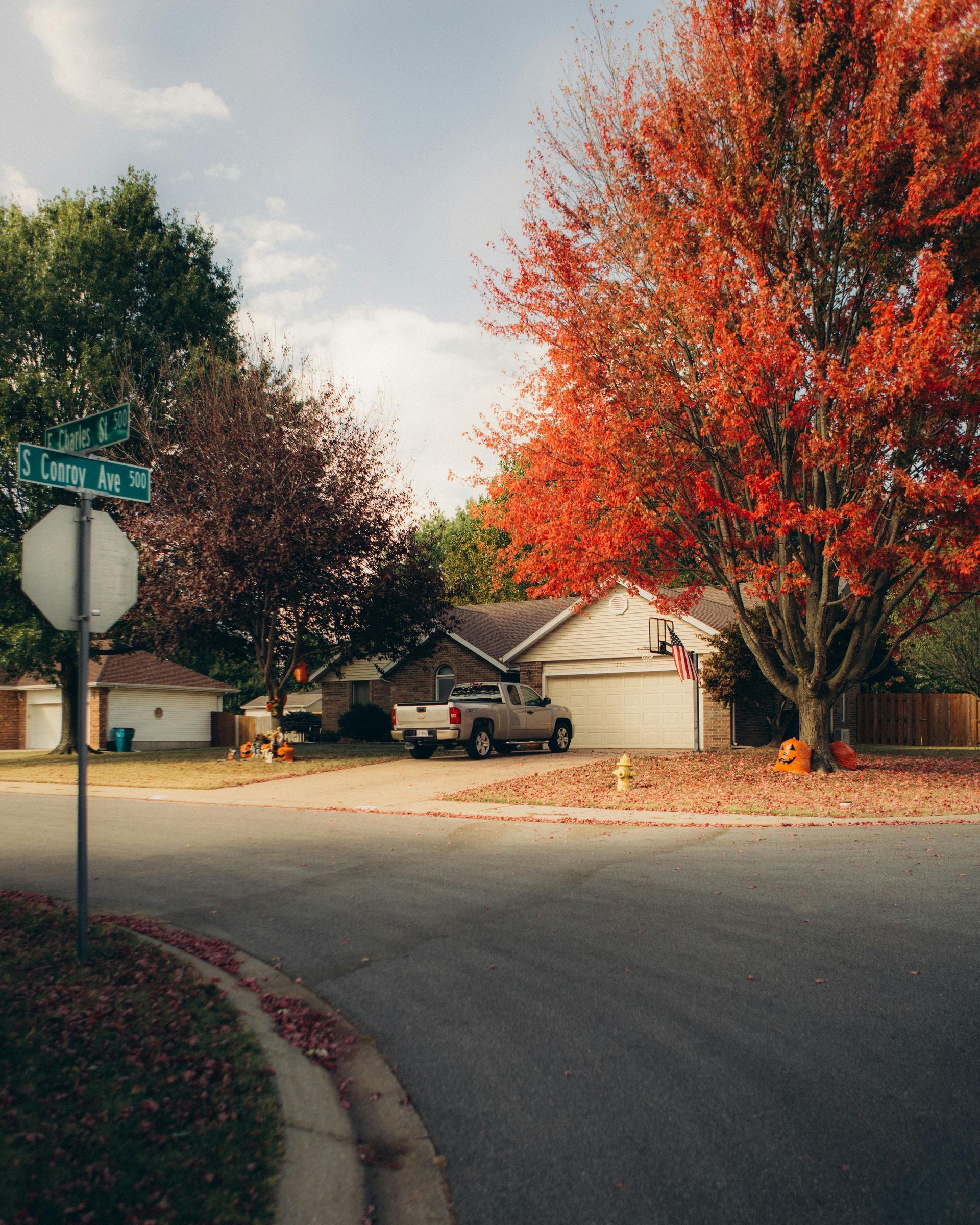 A residential street with a sign that says ' a ' on it