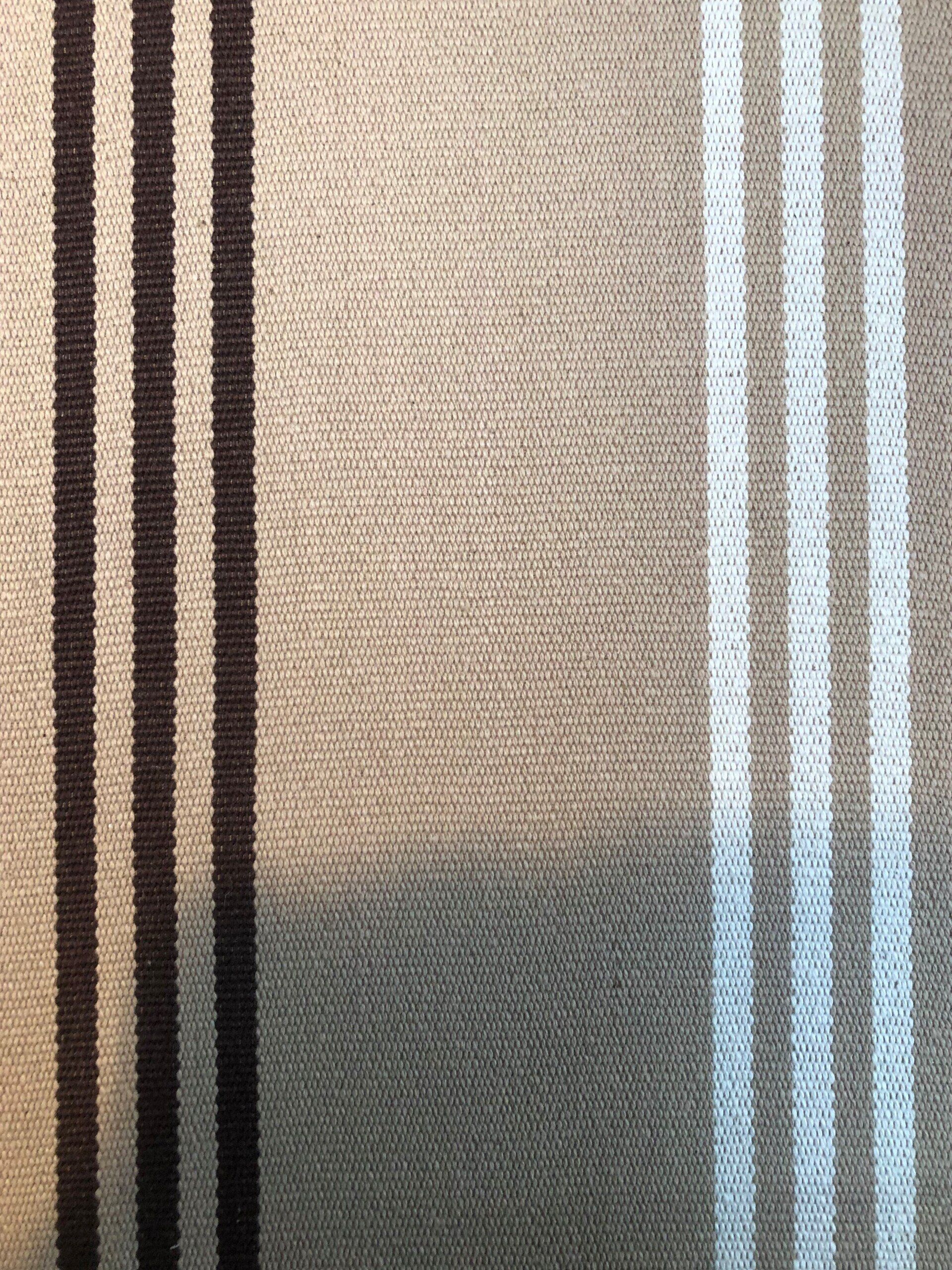 Tan fabric with vertical stripes in brown, tan, and white.