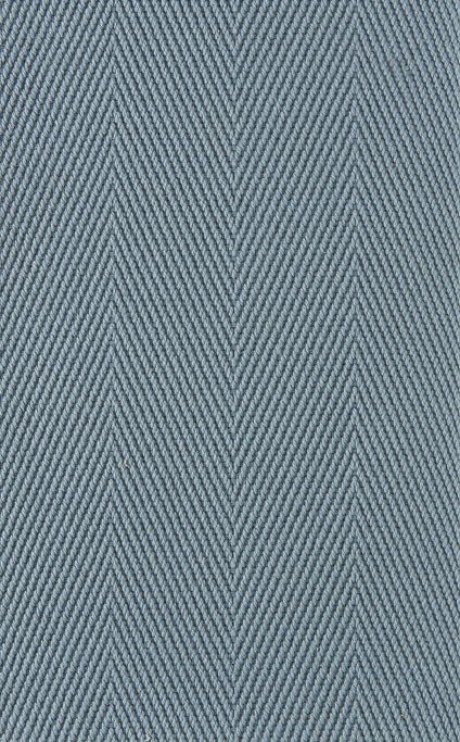 Blue herringbone fabric pattern.
