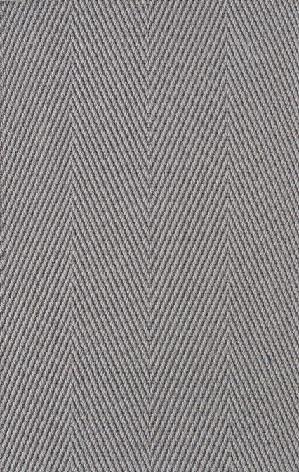 Herringbone-patterned gray fabric.