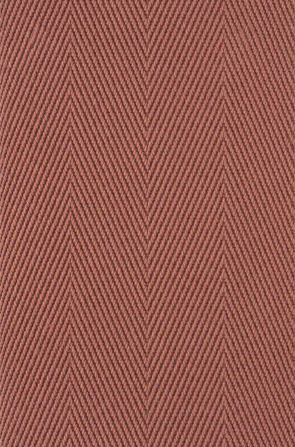 Close-up of a herringbone weave fabric in a muted reddish-brown color.