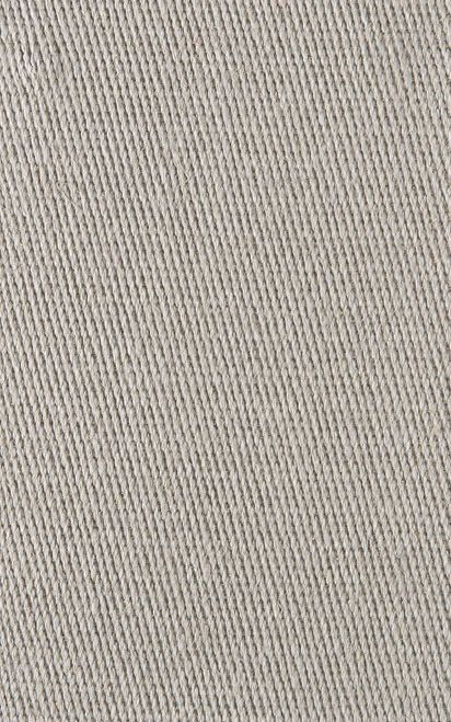 Close-up of beige fabric with a diagonal ribbed texture.