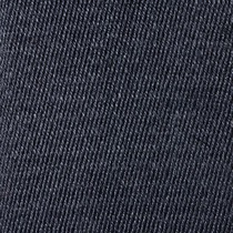 Close-up of dark blue denim fabric with diagonal woven texture.