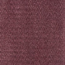 Close-up of burgundy-colored denim fabric, showing diagonal weave texture.