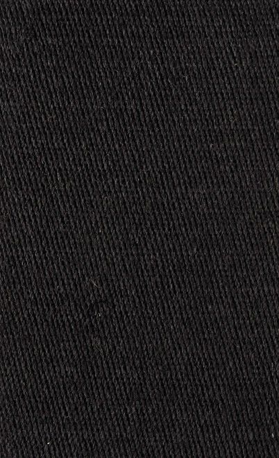 Black fabric texture with visible diagonal weave.