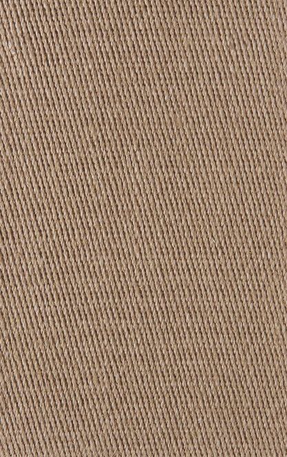 Close-up of tan fabric with a diagonal ribbed weave.