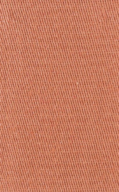 Close-up of orange-brown textured fabric.