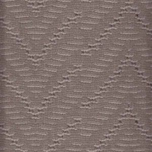 Gray textured fabric with zigzag pattern of small, raised ovals.
