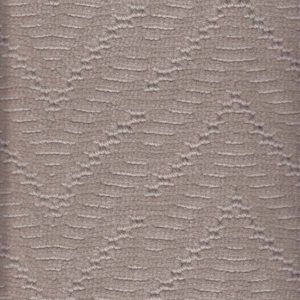 Tan carpet with repeating zig-zag textured pattern.