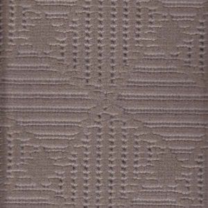 Close-up of brown textured fabric with an embossed geometric floral pattern.