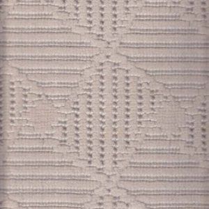 Close-up of white fabric with a diamond-shaped pattern of small holes and horizontal lines.