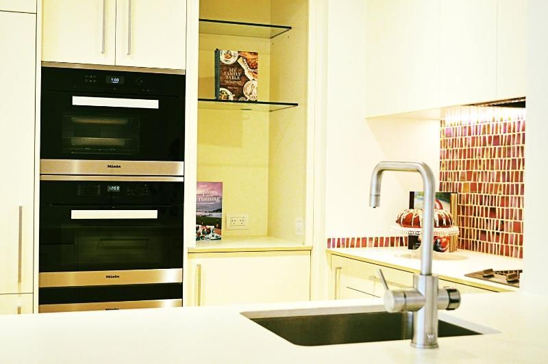 A kitchen with stainless steel appliances and a sink