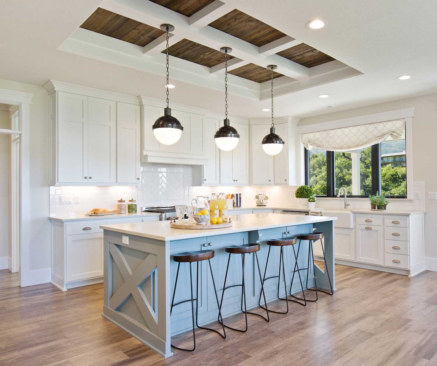 A dining room with a table and chairs and a chandelier.