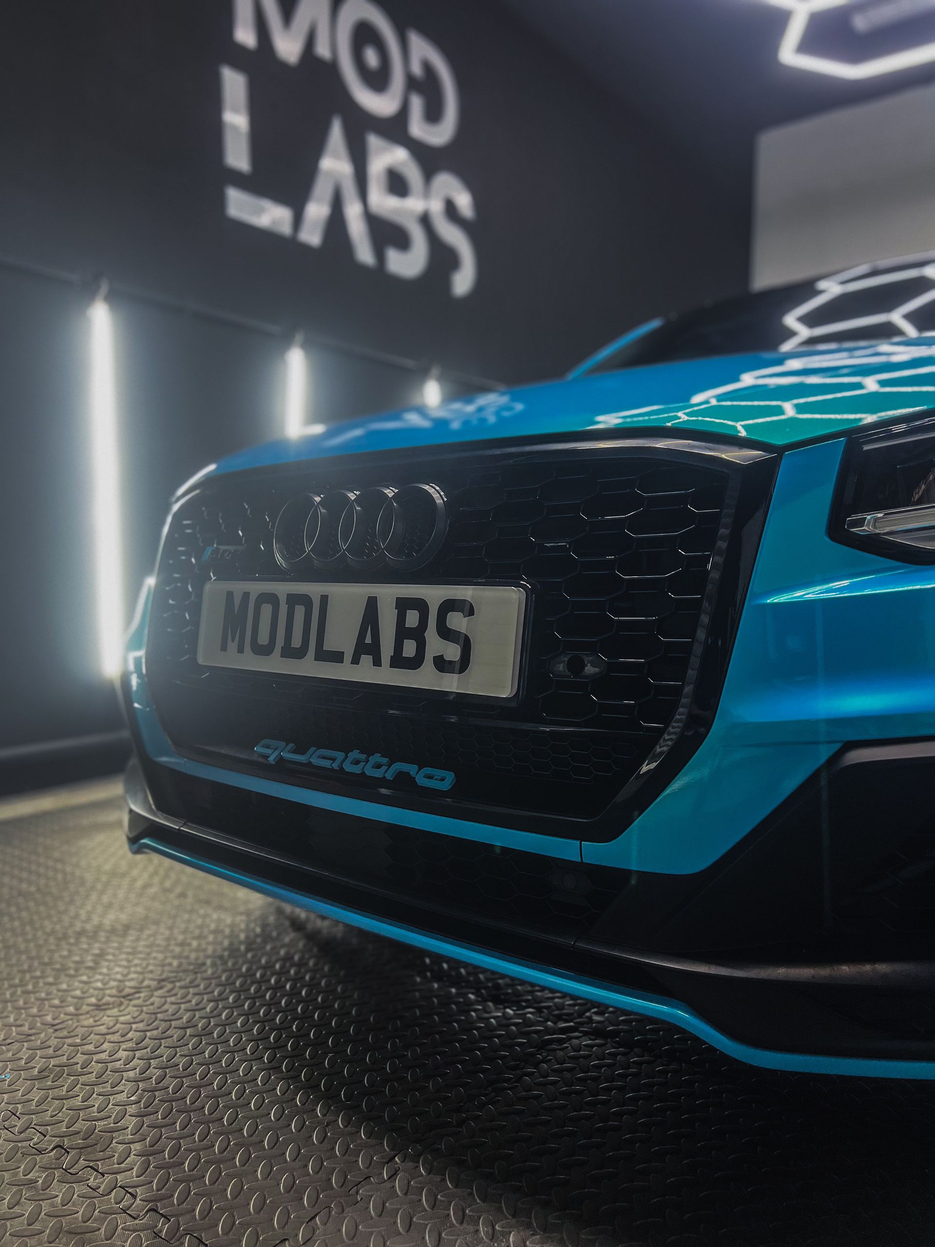 Blue and black Audi Q2 with 