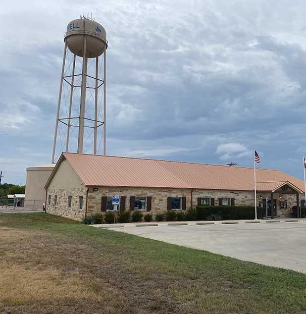 A building with a water tower on top of it