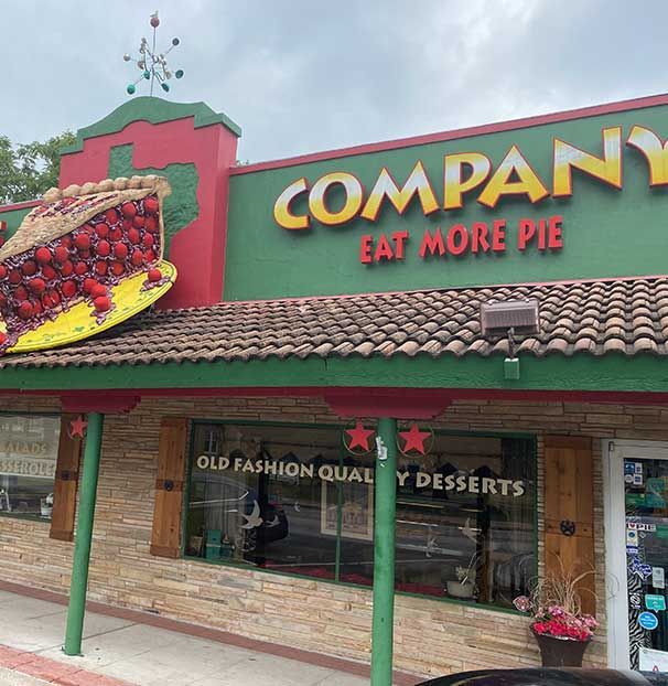 The front of a restaurant called company eat more pie