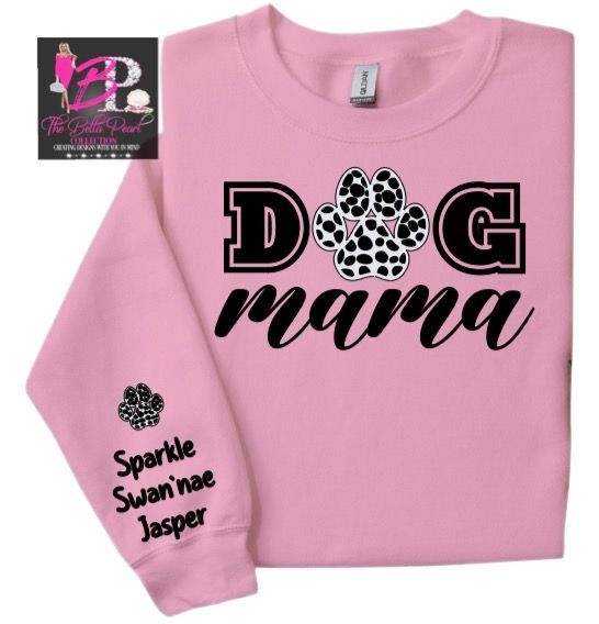A pink shirt that says dog mama on it