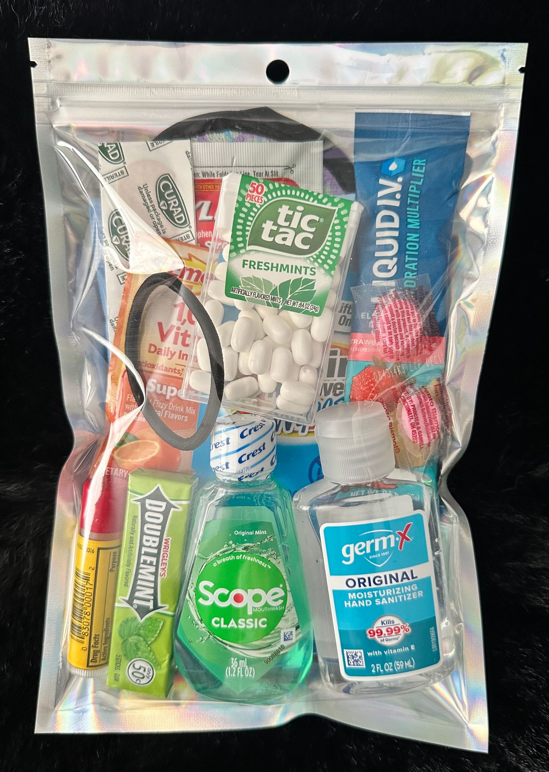 A recovery kit is sitting on top of a black surface.