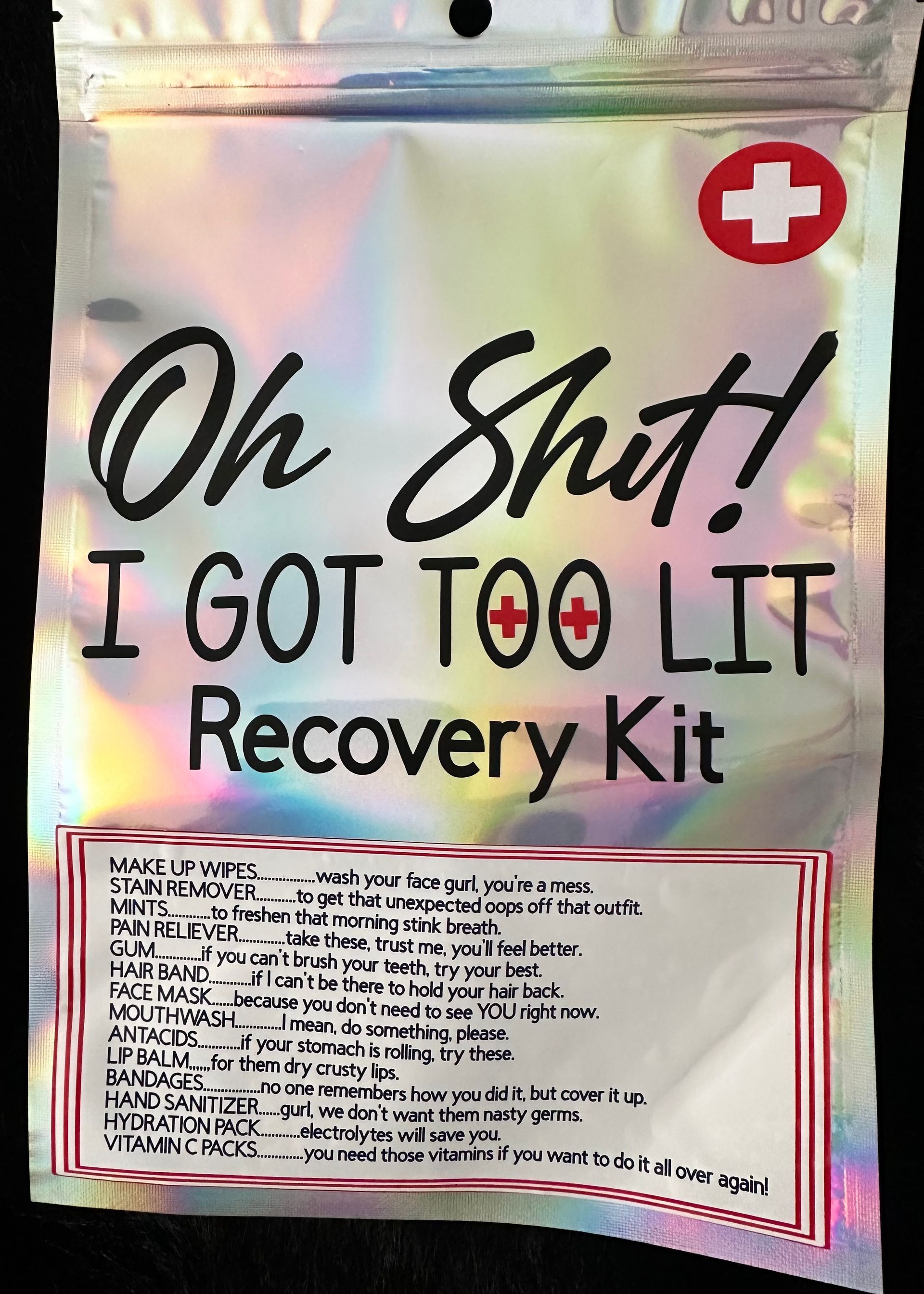 A HANGOVER/RECOVERY KIT WITH LABELING ON THE POUCH
