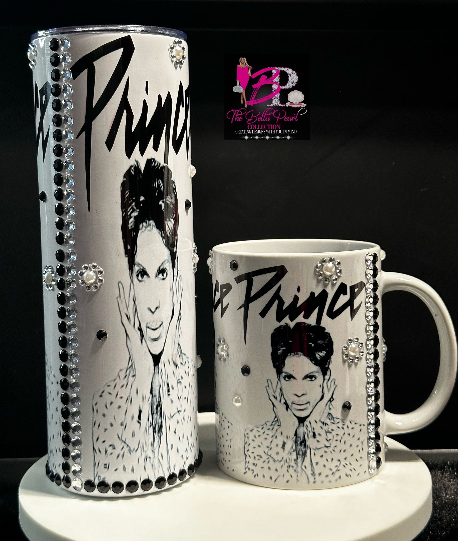 A tumbler and a mug with prince on them with diamonds and pearls