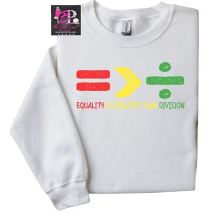 A black shirt that says equality is greater than division