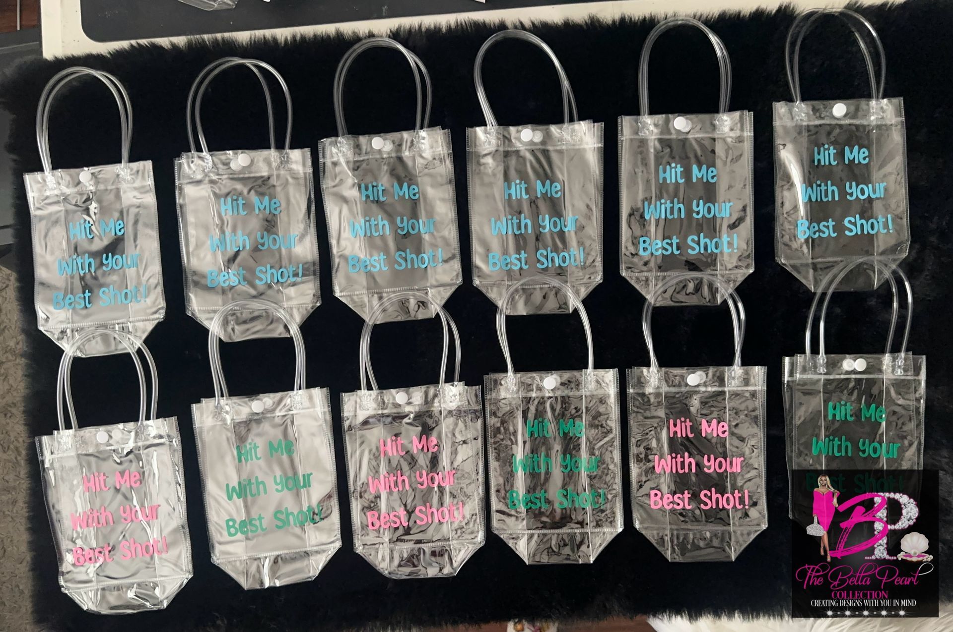 A group of mini shot tumblers saying take a shot with straws