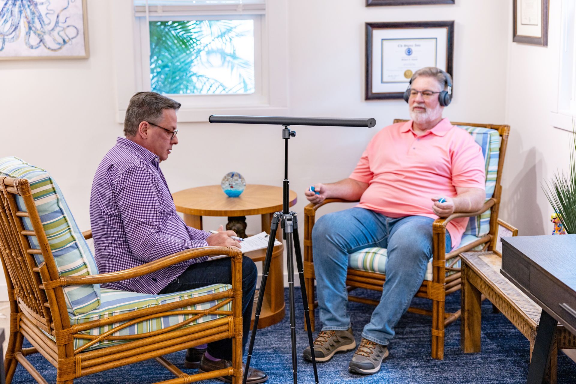 A person holding blocks that read 