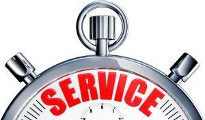 Silver stopwatch with red “SERVICE” text on the face.