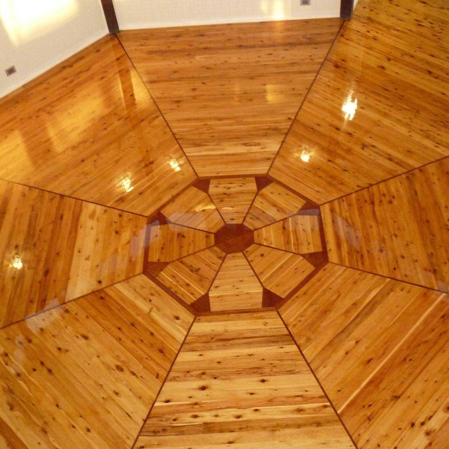 A Wooden Floor With A Circular Pattern On It — AJ's Cleaning & Floor Sanding In Woree, QLD