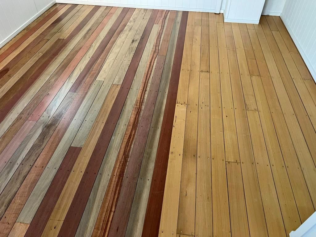 A Wooden Floor With A Striped Pattern In A Room — AJ's Cleaning & Floor Sanding In Woree, QLD