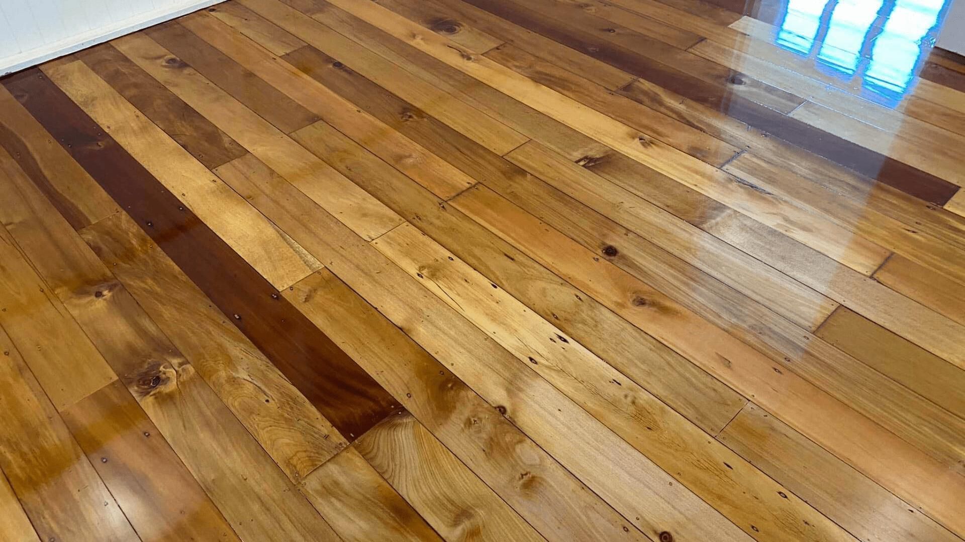 A Close Up Of A Wooden Floor In A Room — AJ's Cleaning & Floor Sanding In Woree, QLD
