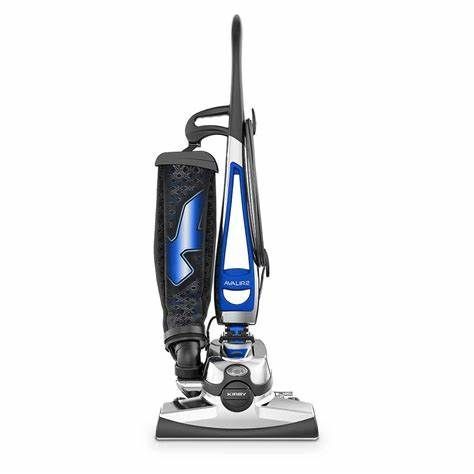 A blue and silver vacuum cleaner on a white background. A blue and silver vacuum cleaner on a white background.
