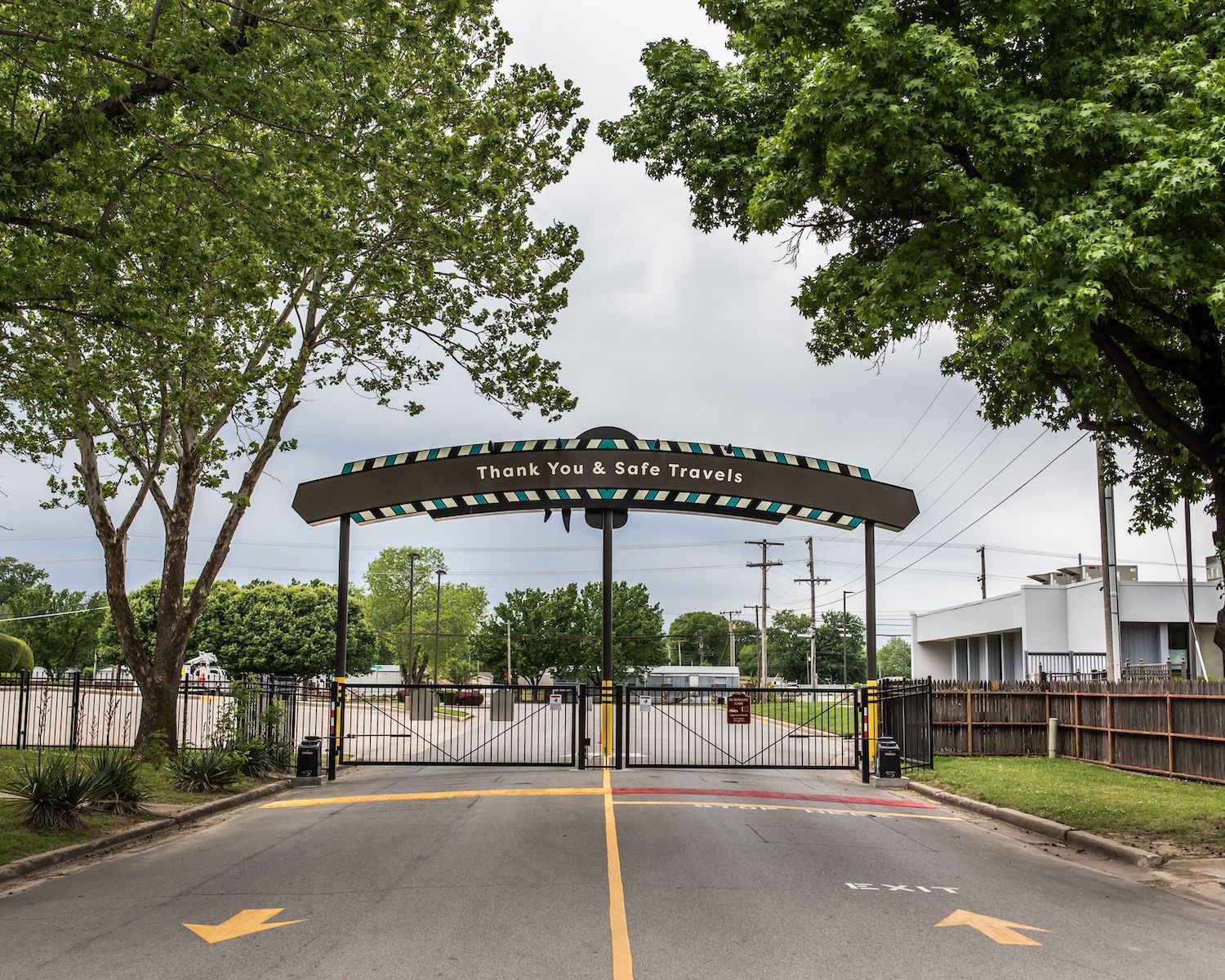A gate with a sign that says 