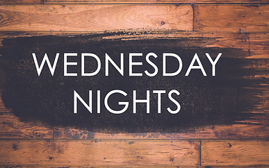 White text reading “WEDNESDAY NIGHTS” on a dark wood background.