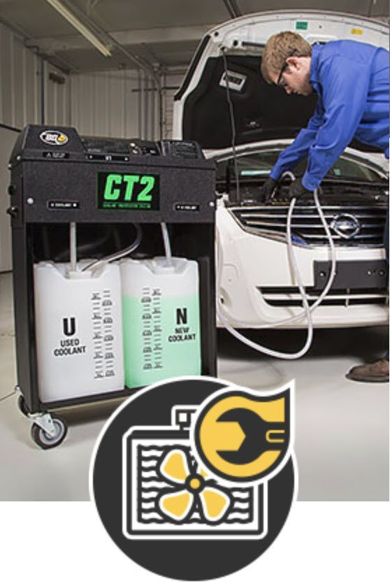 A man is working on a car with a machine that says ct2 on it - A Street Automotive