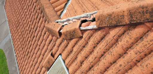 Man repairing a roof | Dandenong, VIC | Roofplus