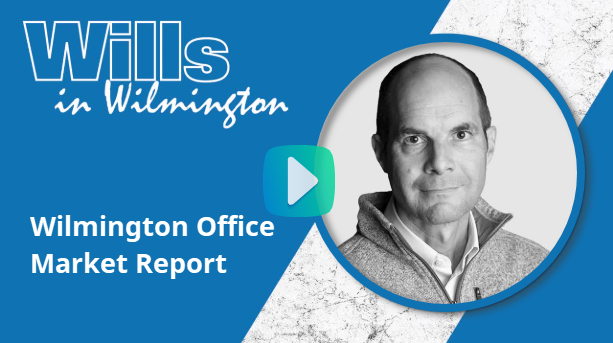 Wilmington office market report with a man in a circle