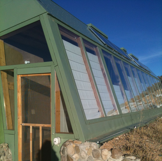 0ff-the-grid earthship house front face