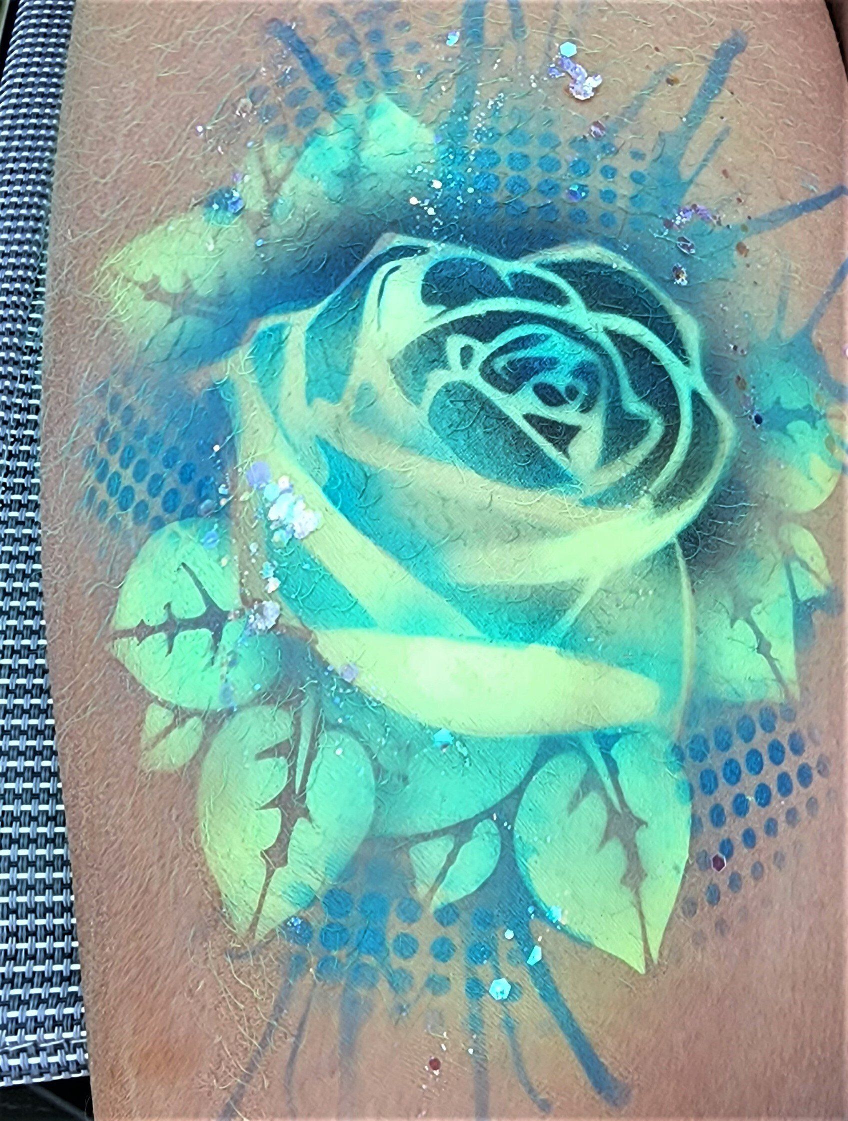 Airbrush temporary tattoo for kids and adults. Summer festival entertainment