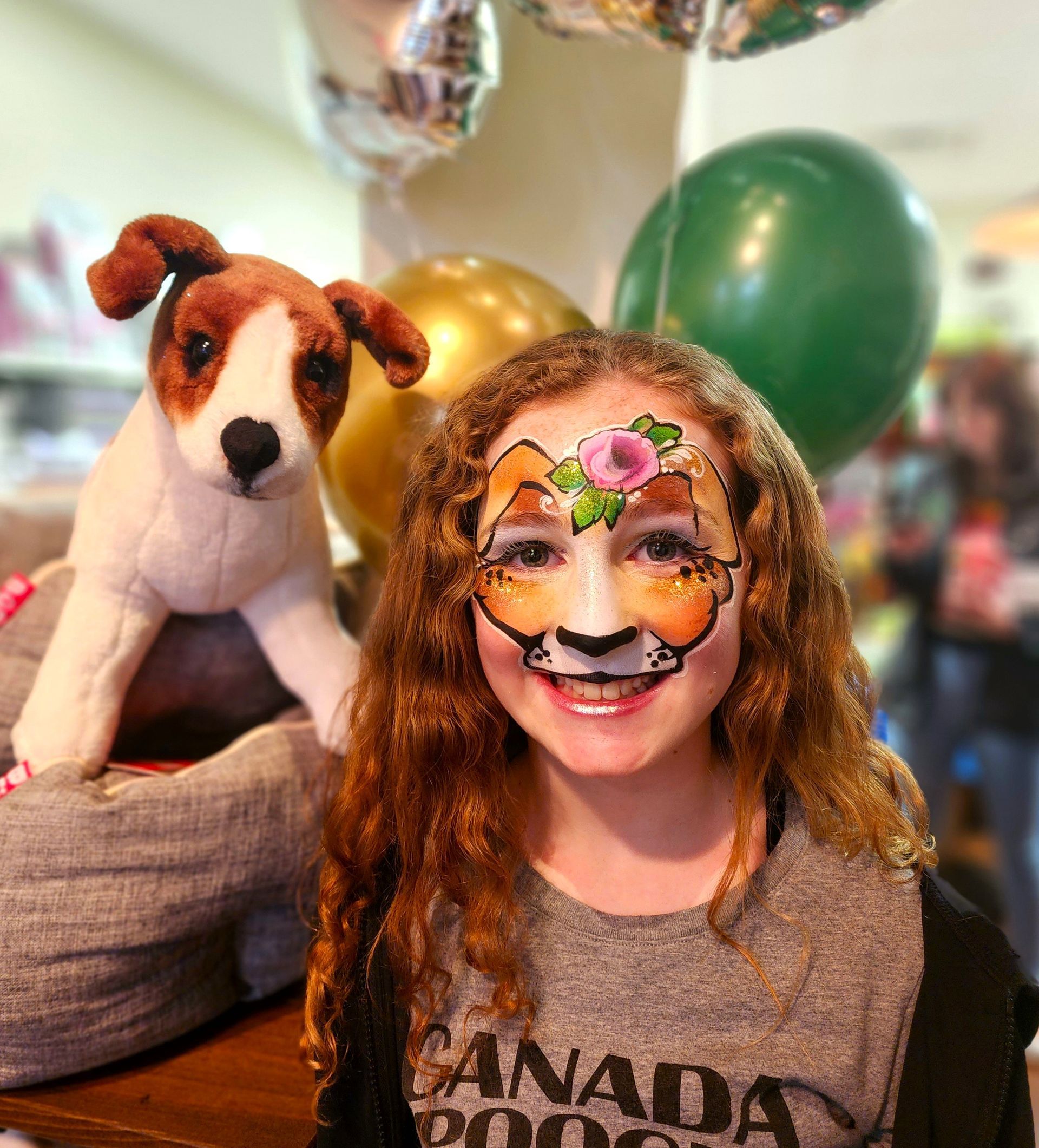 Pet store anniversary day event. Face painting animal designs. Dog face paint