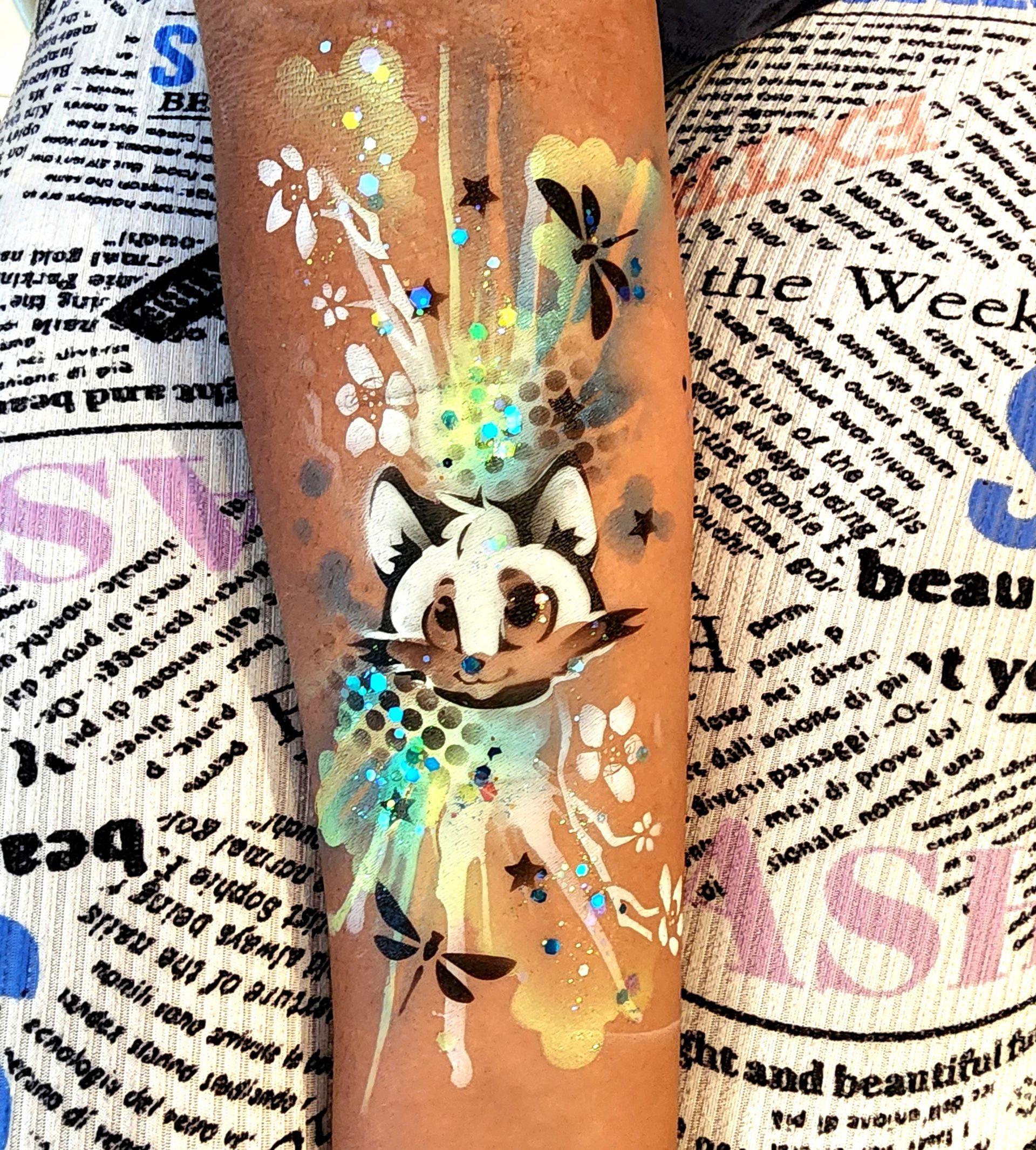 Airbrush temporary tattoos. Corporate family day activity foe kids and adults